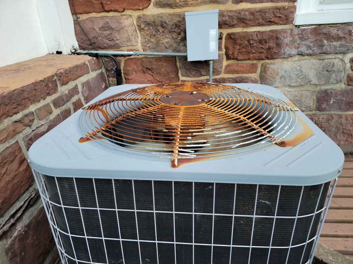 rust or rusty metal on air conditioning unit or machine