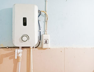 tankless water heater on wall of home