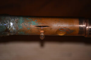 Burst copper water pipe, still dripping.