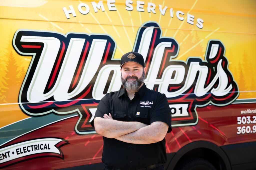 Wolfer's technician in front of van.