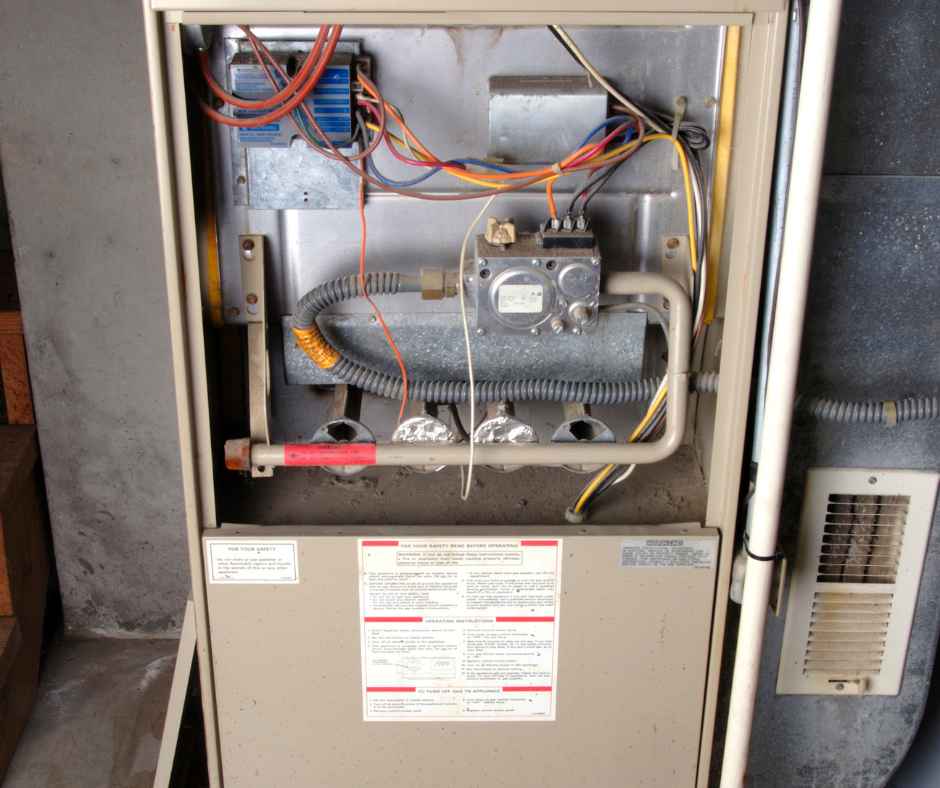 An open back of a home furnace